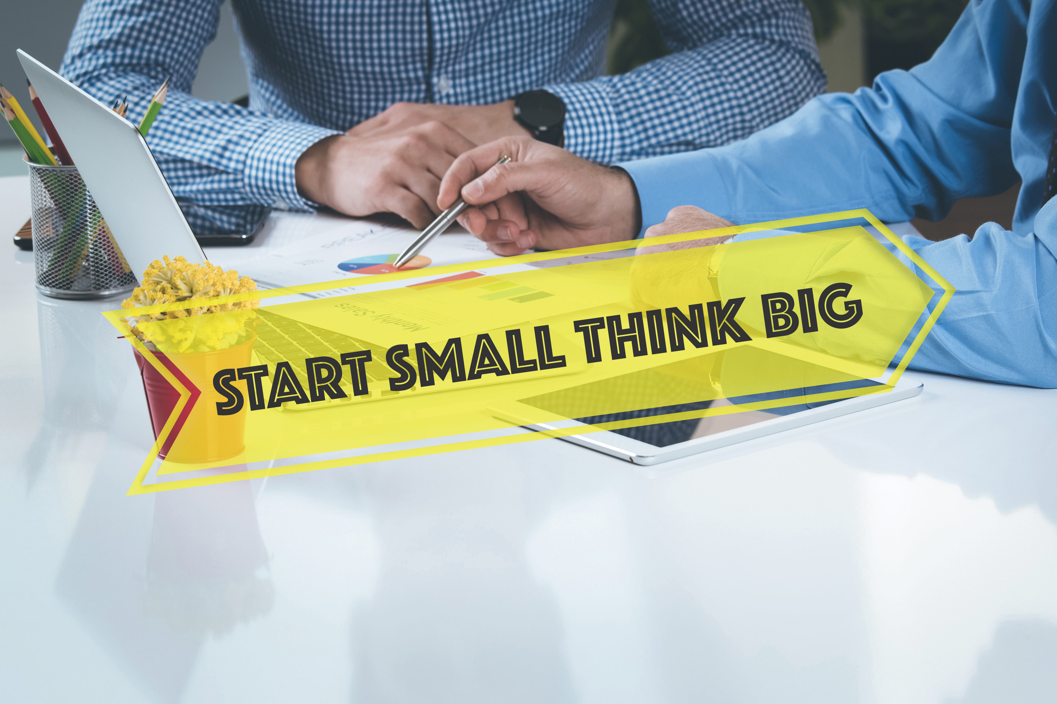 Image of businessmen working on a project - represents that Beyond a Property Development Tip Start small think big is a mindset you need to have as a beginner property investor