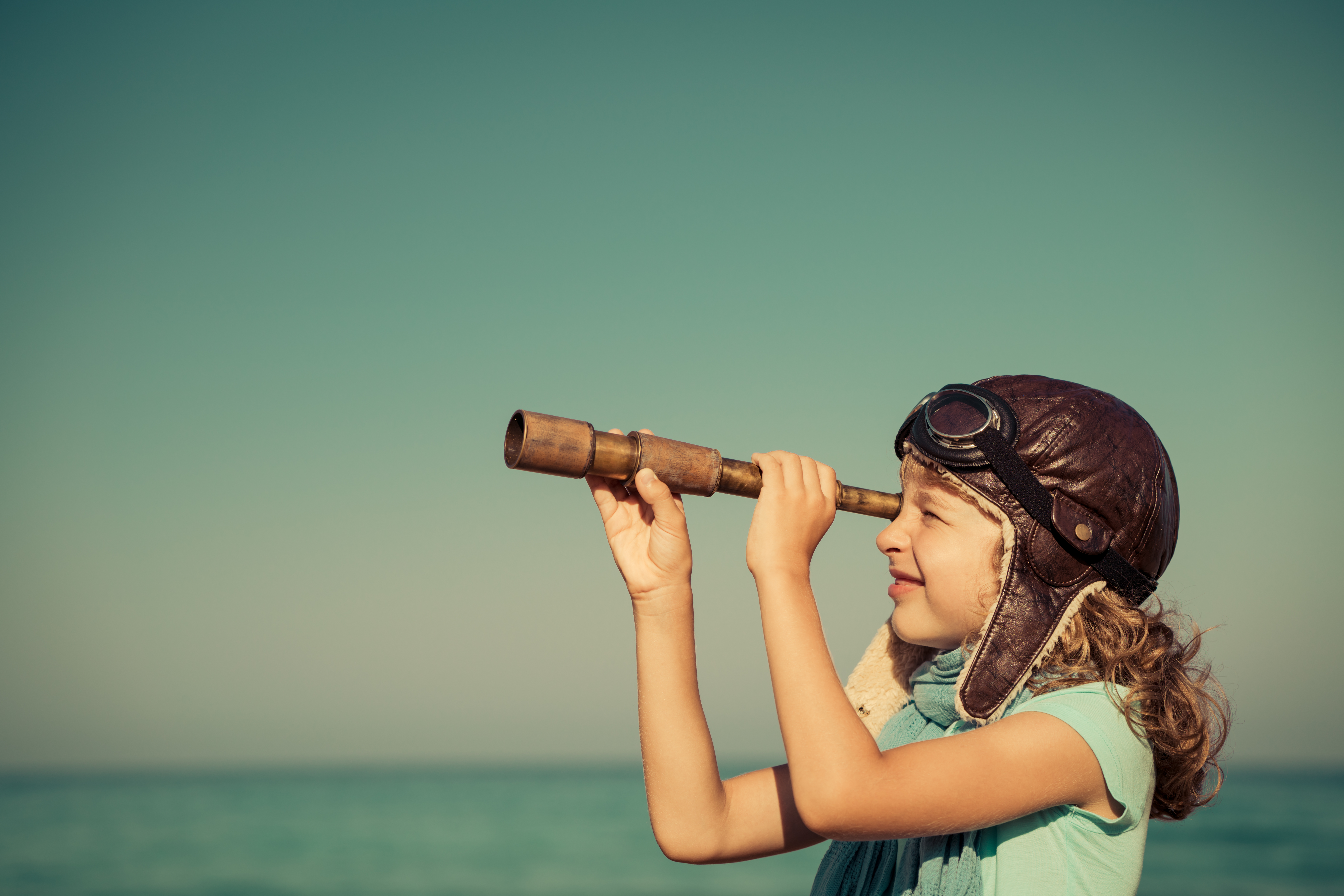Image of a Happy kid playing outdoor - represents that One of the best ways to Get what you want in life is to follow your Kid vision